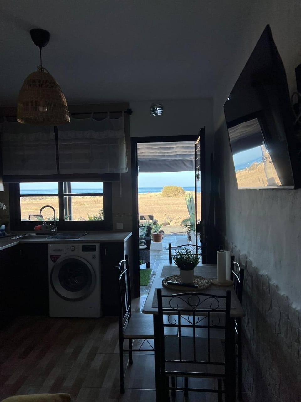 Natural landscape, TV and multimedia, View (from property/room), Living room, Seating area, Dining area, Beach, Garden view, Sea view, washing machine