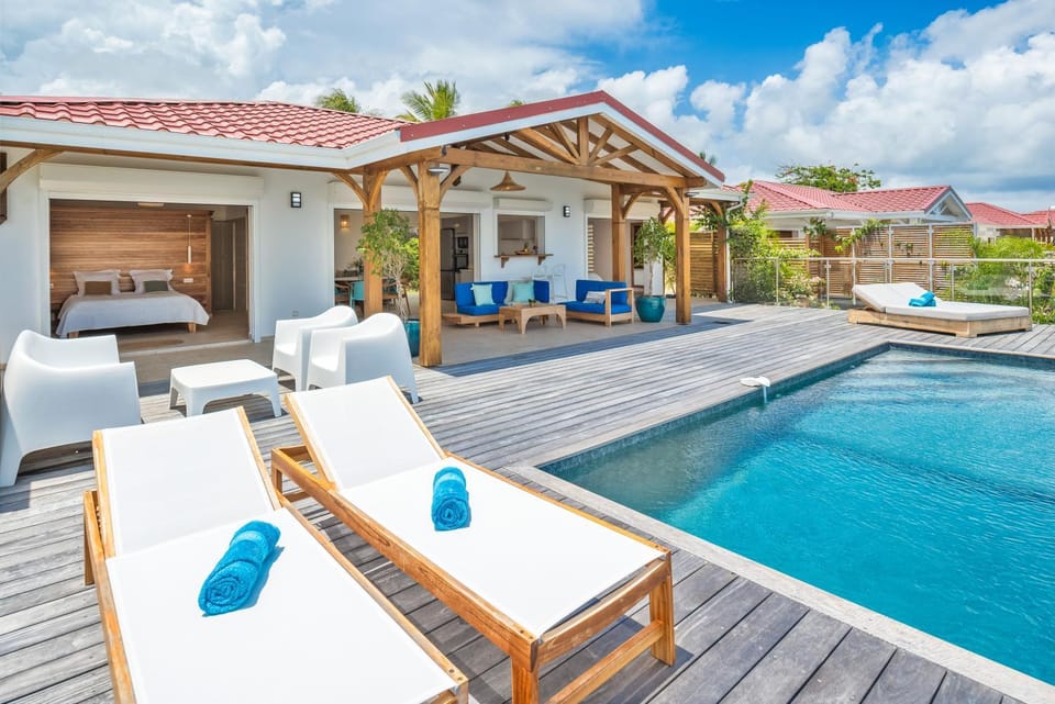 Property building, Patio, Day, Natural landscape, View (from property/room), Balcony/Terrace, Living room, Seating area, Pool view, Swimming pool, sunbed