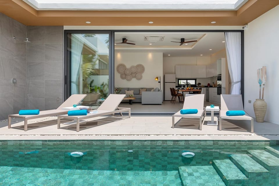 Living room, Seating area, Pool view, Swimming pool, sunbed