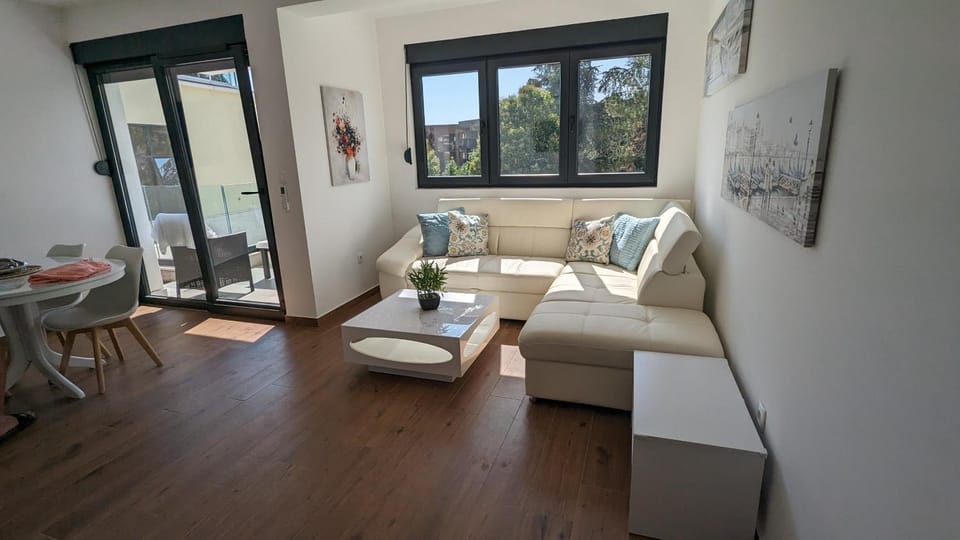 View (from property/room), Living room, Seating area, Dining area, Mountain view, Sea view, Street view