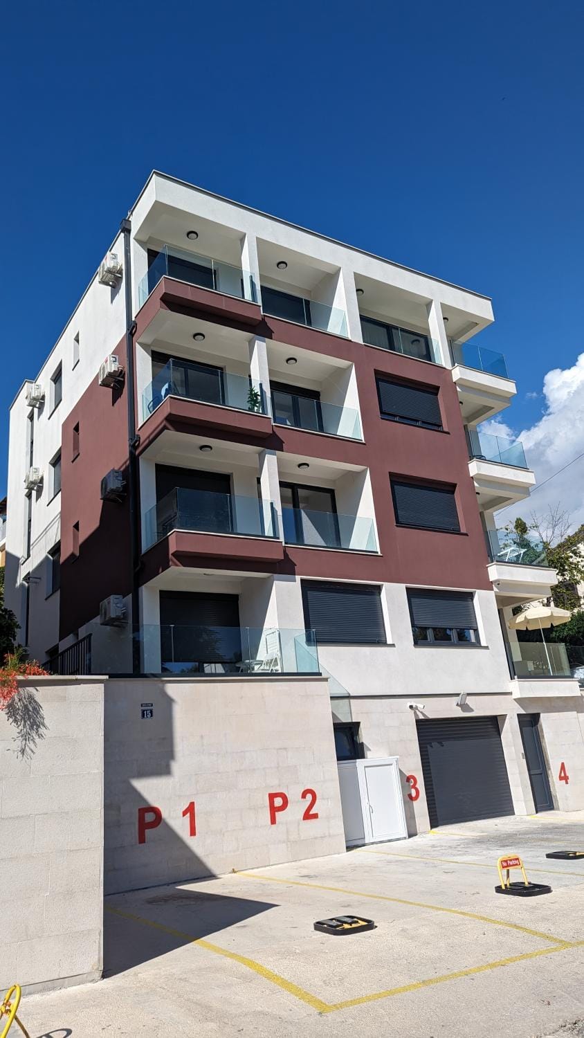 Property building, Facade/entrance, Day, Parking
