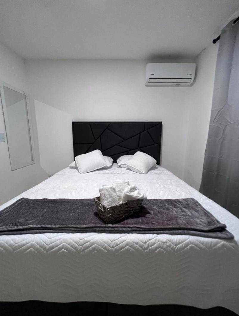 Bed, air conditioner