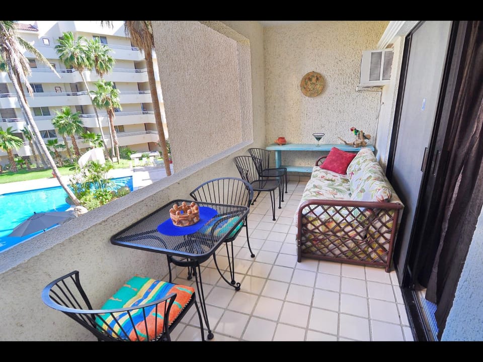Patio, View (from property/room), Balcony/Terrace, Seating area, Dining area, Pool view, Swimming pool