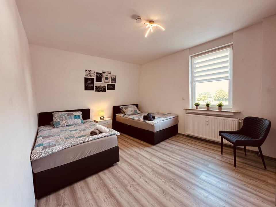 Bed, Photo of the whole room, Bedroom, flat iron, towels, wardrobe