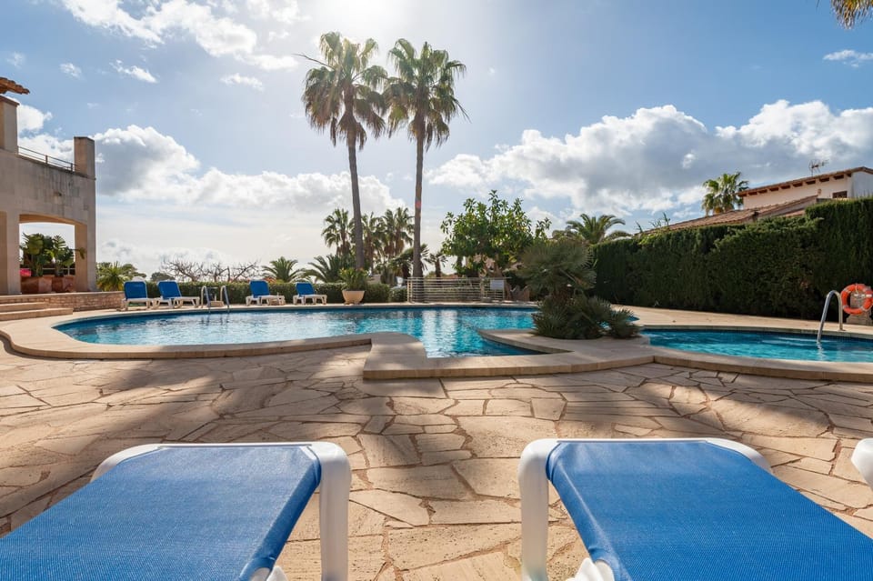 Property building, Living room, Swimming pool