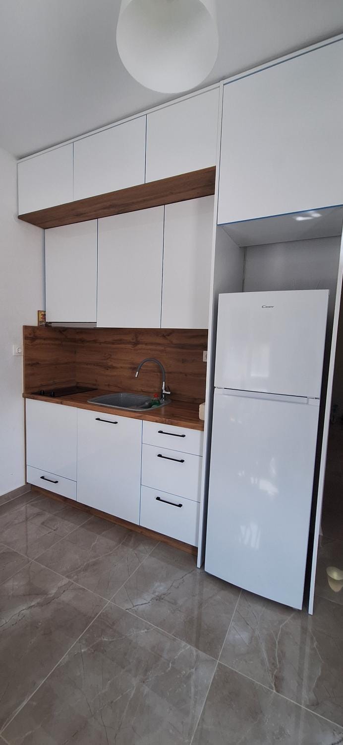 Kitchen or kitchenette, stove