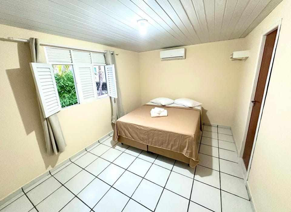Bed, Photo of the whole room, Bedroom, towels, air conditioner