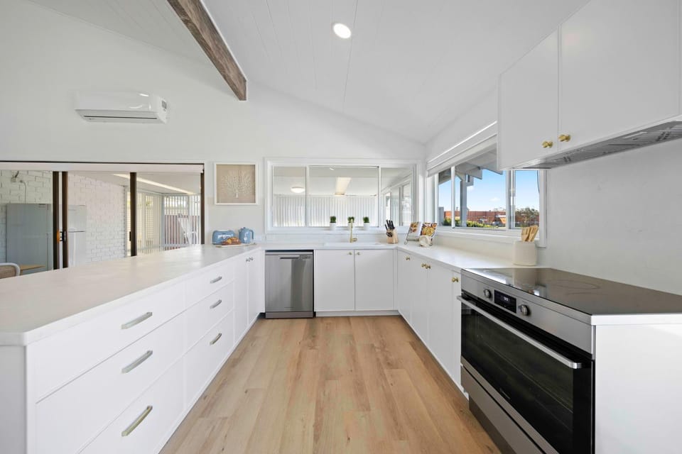 Kitchen or kitchenette, dishwasher, oven, kitchen, air conditioner