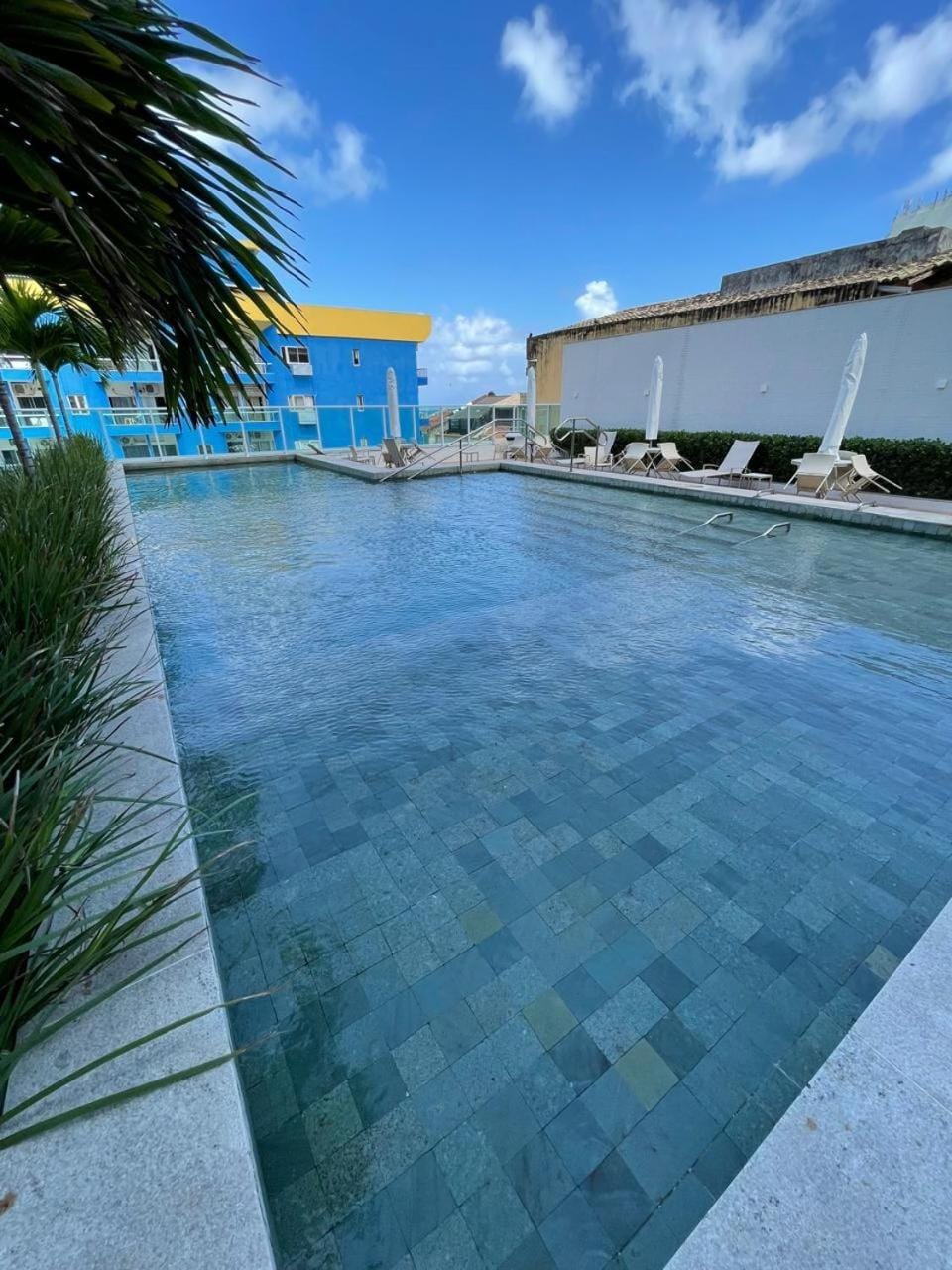 Swimming pool, sunbed