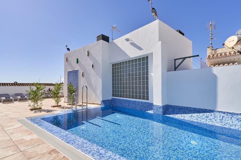 Property building, Living room, Swimming pool