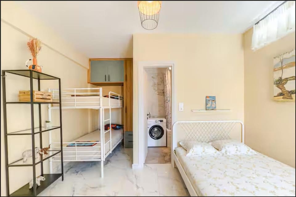 Bed, Bedroom, bunk bed, towels, washing machine, dryer