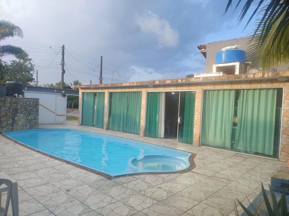 Casa Piscina R 9 Cond Sao Luiz Peruibe Recanto do sossego House in Peruíbe