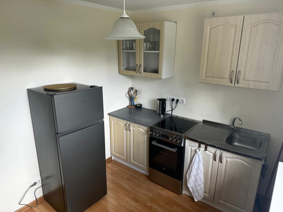 Kitchen or kitchenette, stove