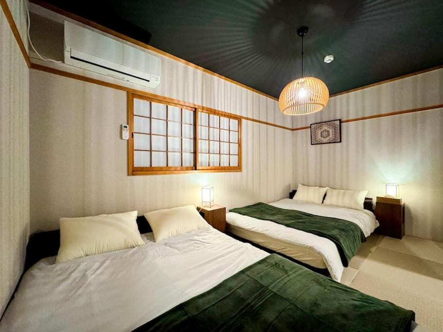 fuji 5つの寝室 ベッド10台 お風呂3台 サウナ付き グループに最適 Villa in Osaka