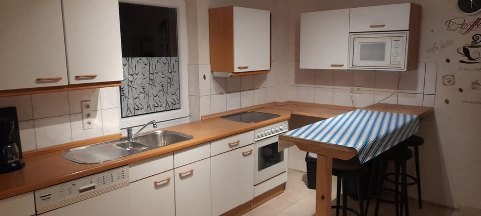 Dining area, dishwasher, oven, stove