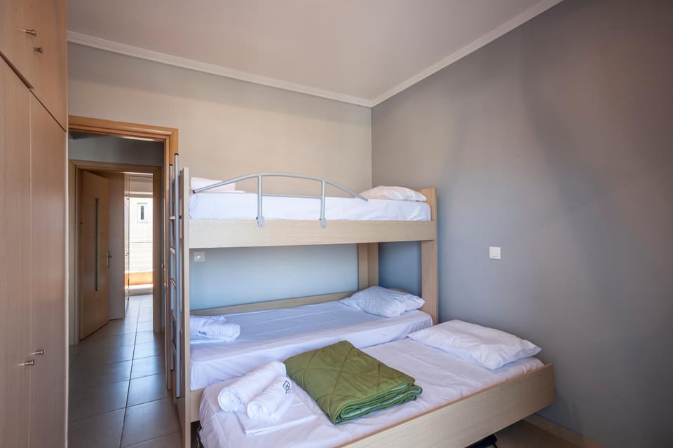 Bed, Photo of the whole room, Bedroom, bunk bed, towels, wardrobe
