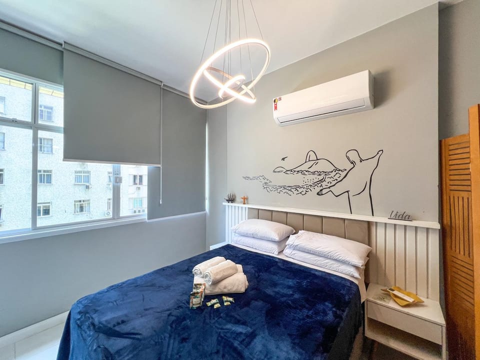 Bed, Photo of the whole room, Bedroom, towels, air conditioner