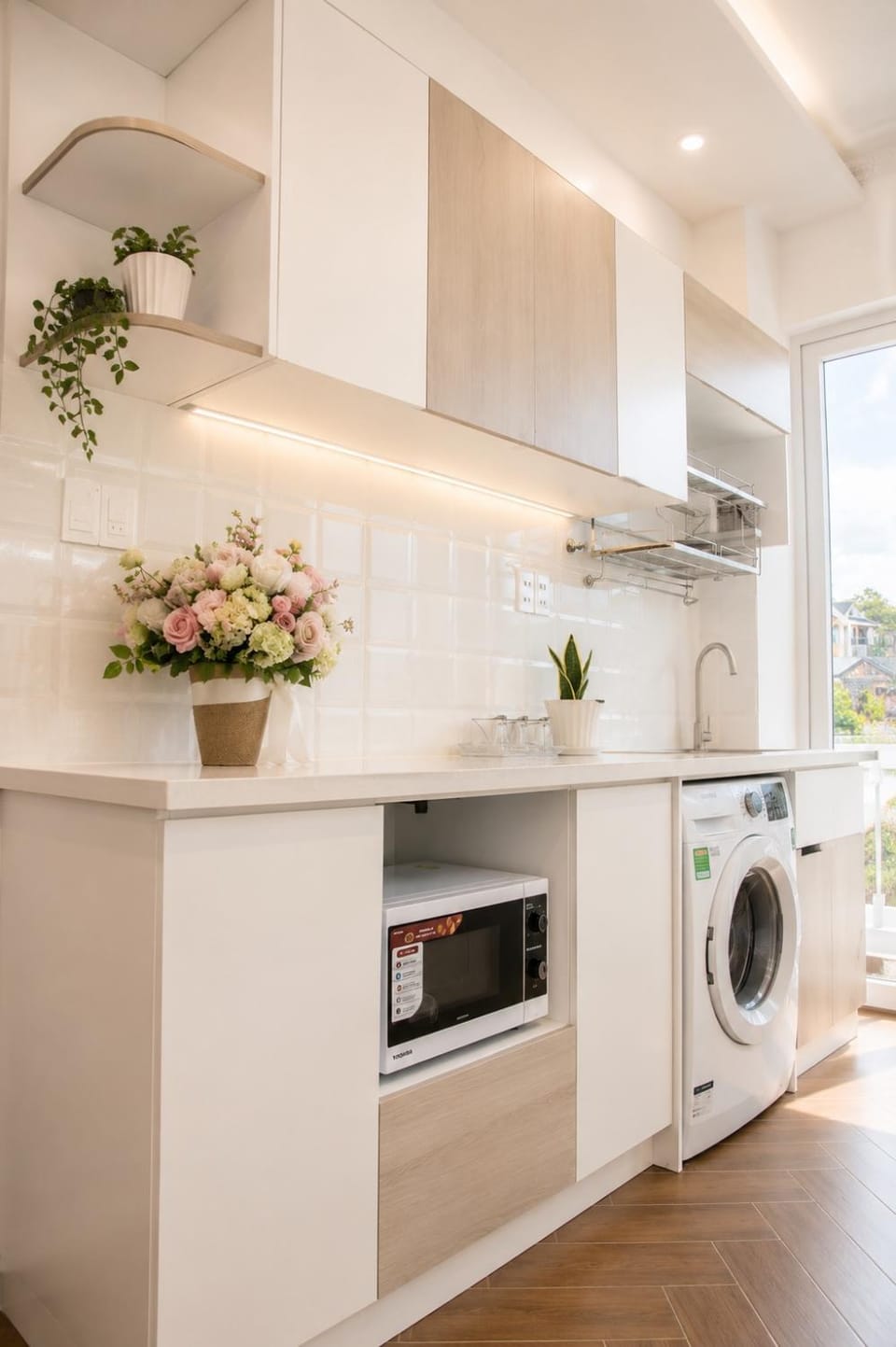 Kitchen or kitchenette, oven, stove, washing machine
