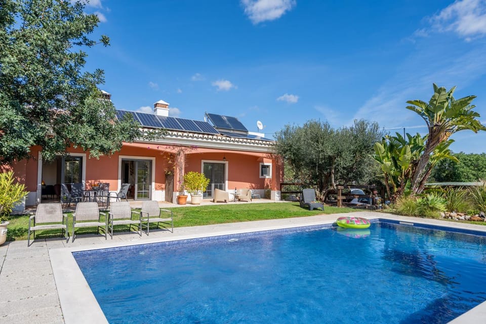 Property building, Living room, Swimming pool