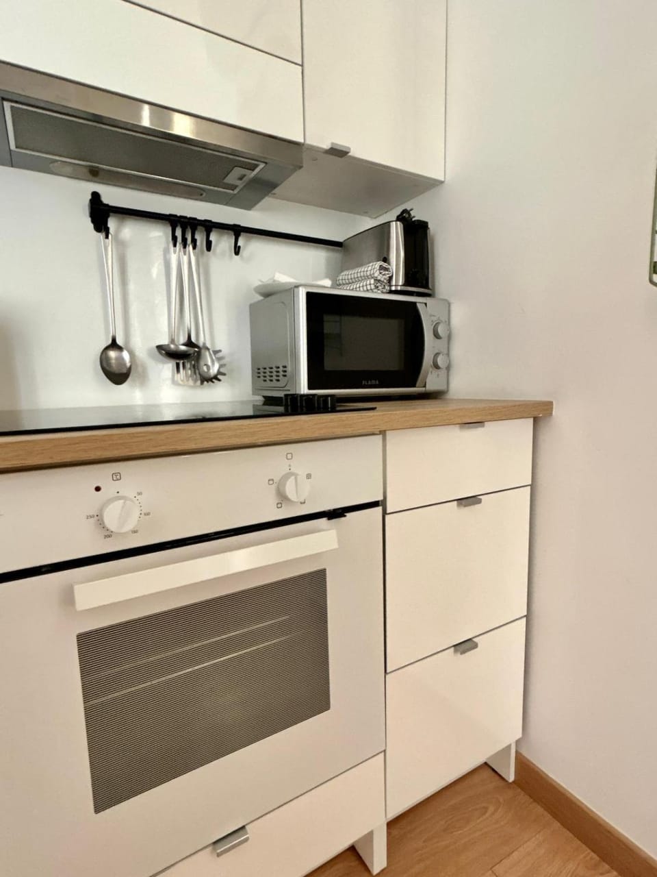 Kitchen or kitchenette, microwave, oven, kitchen