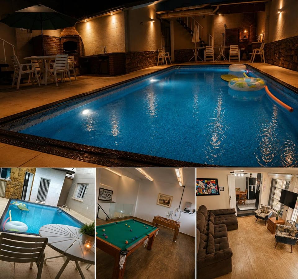 Belíssima Casa a Beira Mar com Piscina Aquecida Cobrado a Parte, 5 Quartos com Ar Condicionado, Amplo Salão de Jogos com Mesas de Bilhar e Pebolim, Amplo Espaço Externo com Churrasqueira em Deck Gourmet Coberto frente a Piscina,Tudo isso á Beira Mar House in State of São Paulo