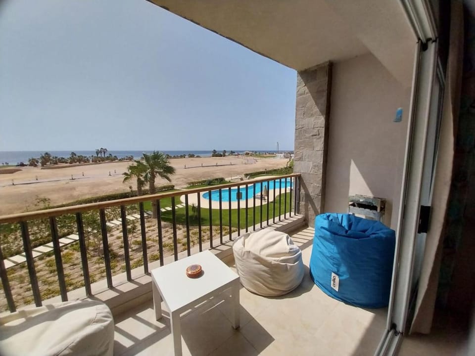 View (from property/room), Balcony/Terrace, Balcony/Terrace, Seating area, Beach, Pool view, Sea view, Swimming pool