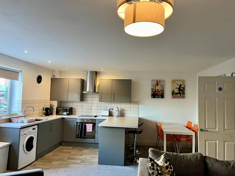 Kitchen or kitchenette, Living room, Seating area, Dining area, oven, toaster