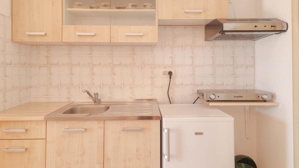 Kitchen or kitchenette, stove