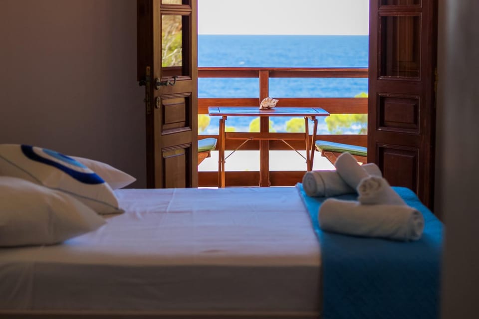 Bed, Natural landscape, View (from property/room), Bedroom, Sea view, towels