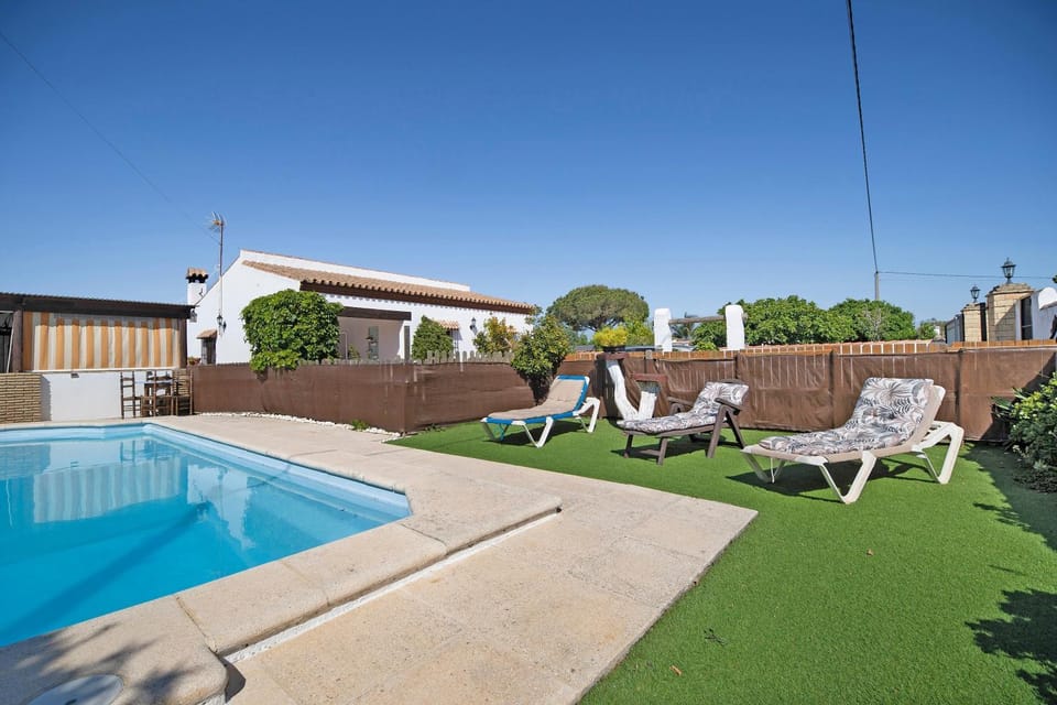 Property building, Living room, Swimming pool