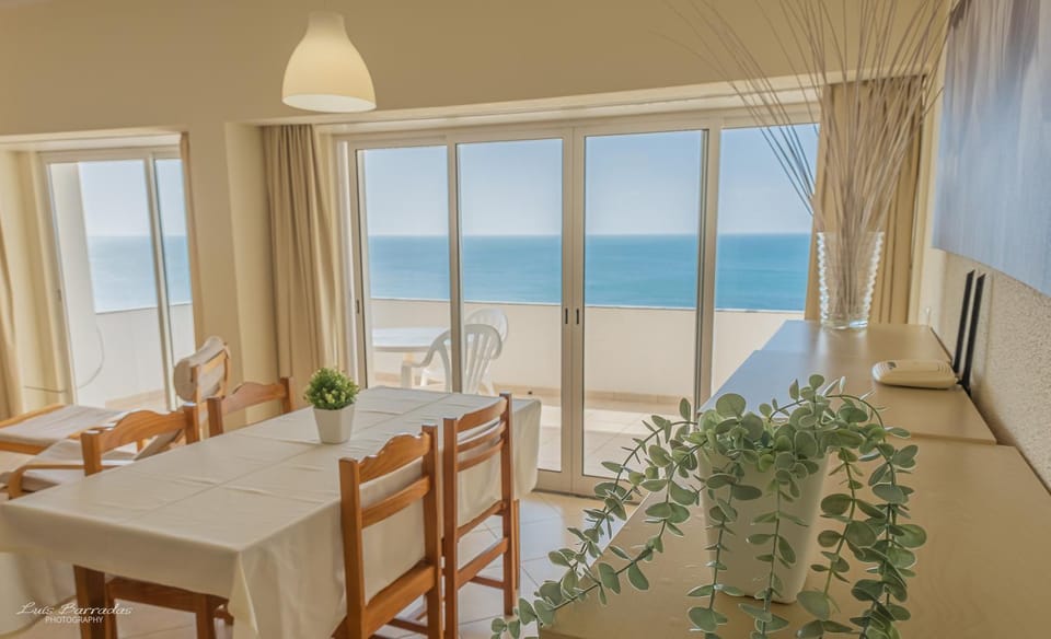 Natural landscape, View (from property/room), Balcony/Terrace, Living room, Dining area, Beach, Sea view