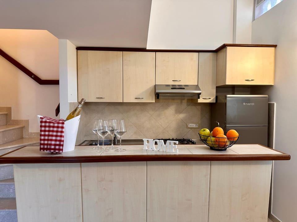 Kitchen or kitchenette, oven, stove