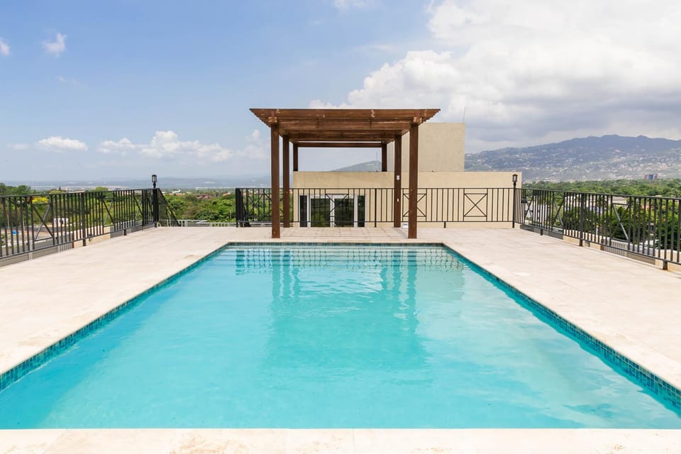 Choose To Be Happy at Twenty 2A 2-Bedroom w Pool Apartment in Kingston