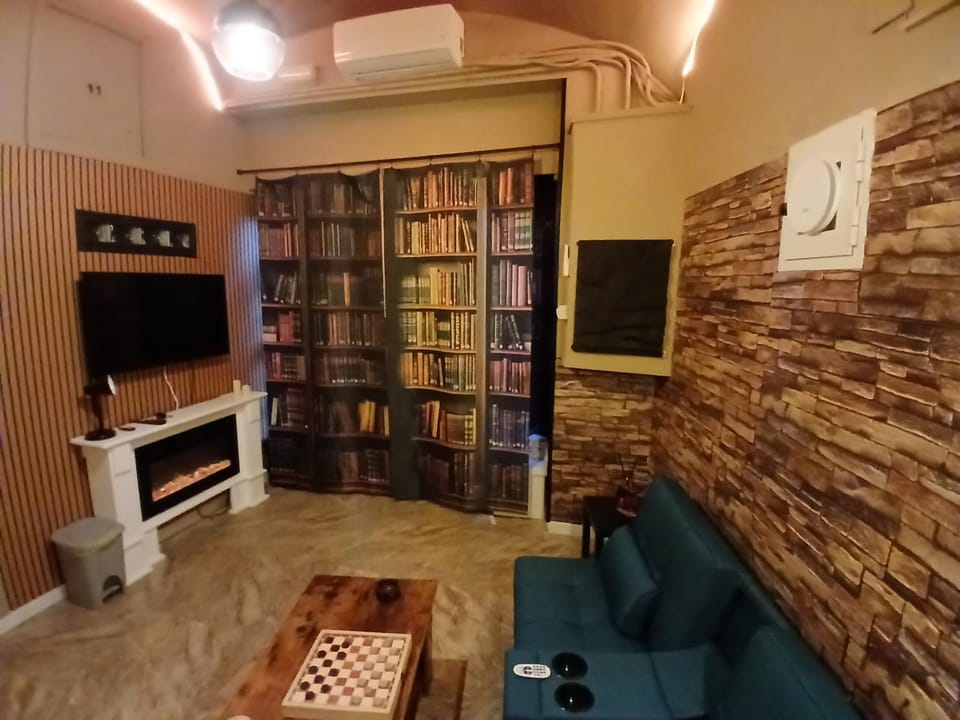 Living room, Seating area, Evening entertainment, air conditioner