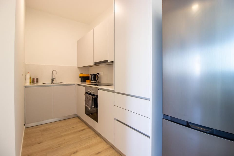 Kitchen or kitchenette, oven, stove