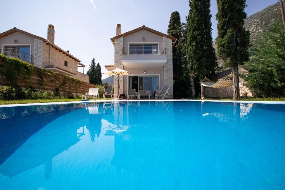 Property building, Living room, Swimming pool