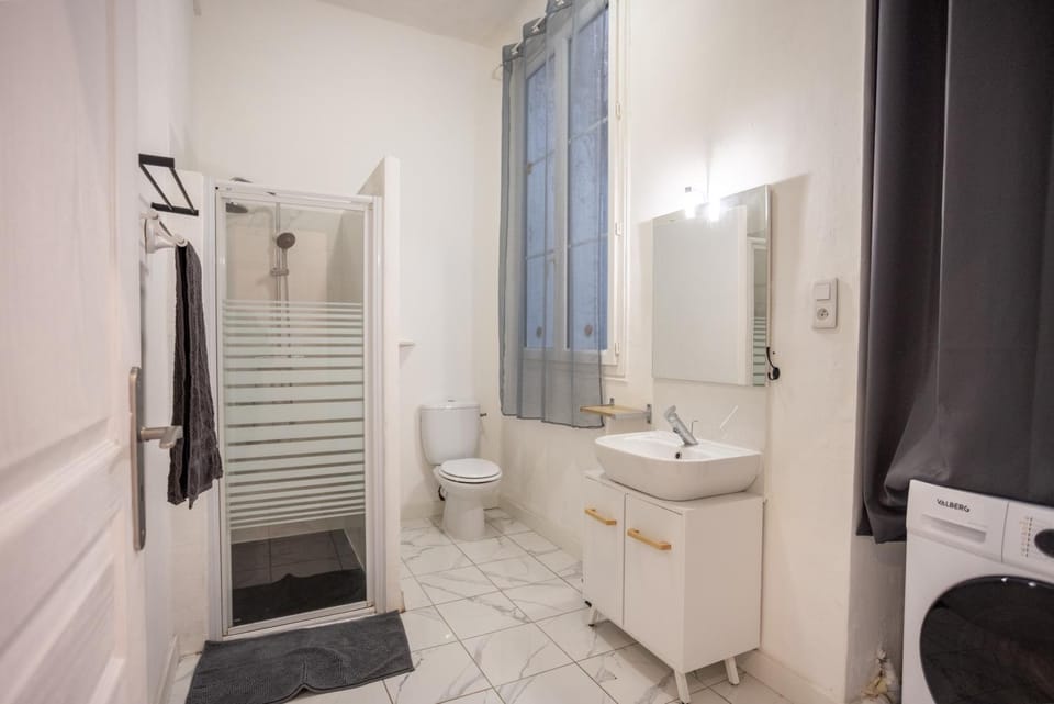 Shower, Toilet, Bathroom, towels, washing machine, dryer