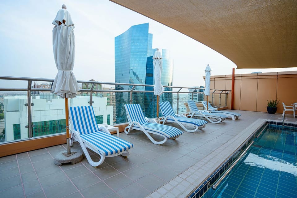 Swimming pool, sunbed