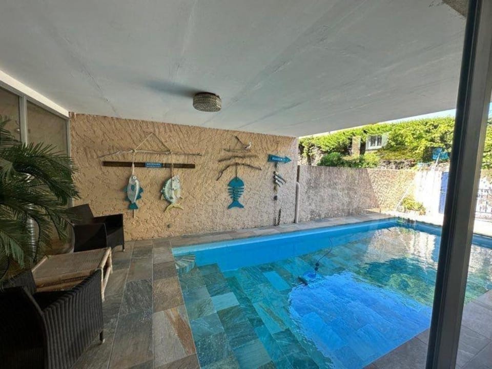Property building, Living room, Swimming pool