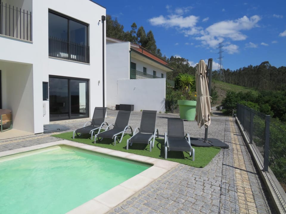 Property building, Patio, Swimming pool, sunbed