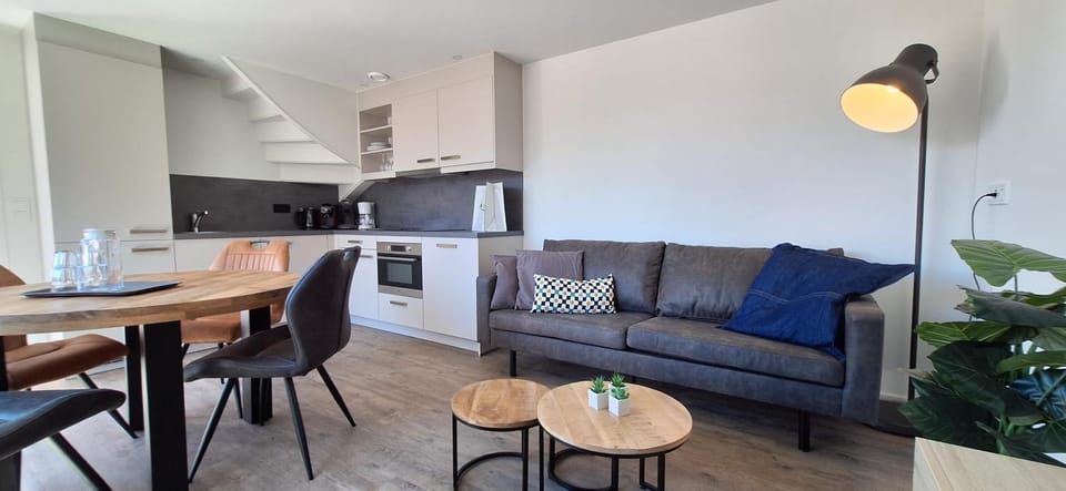 Living room, Seating area, Dining area, oven, stove, kitchen