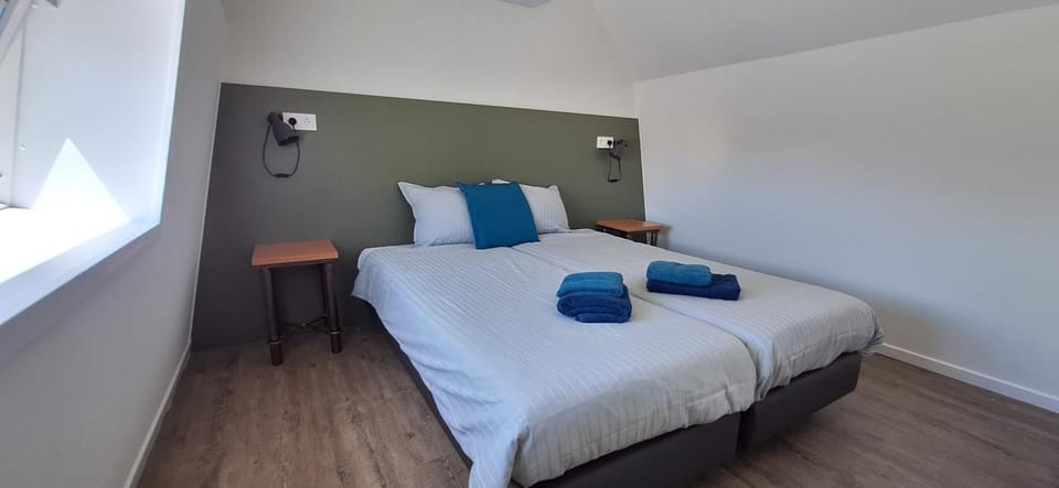 Bed, Photo of the whole room, Bedroom, towels, air conditioner