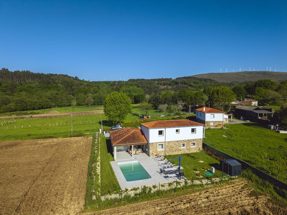 Property building, Natural landscape, Bird's eye view, Mountain view, Swimming pool