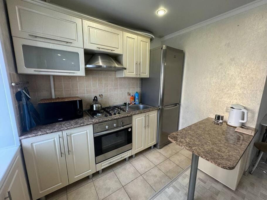 Трехкомнатная квартира в центре города с выходом в центральный Парк Apartment in Kazakhstan