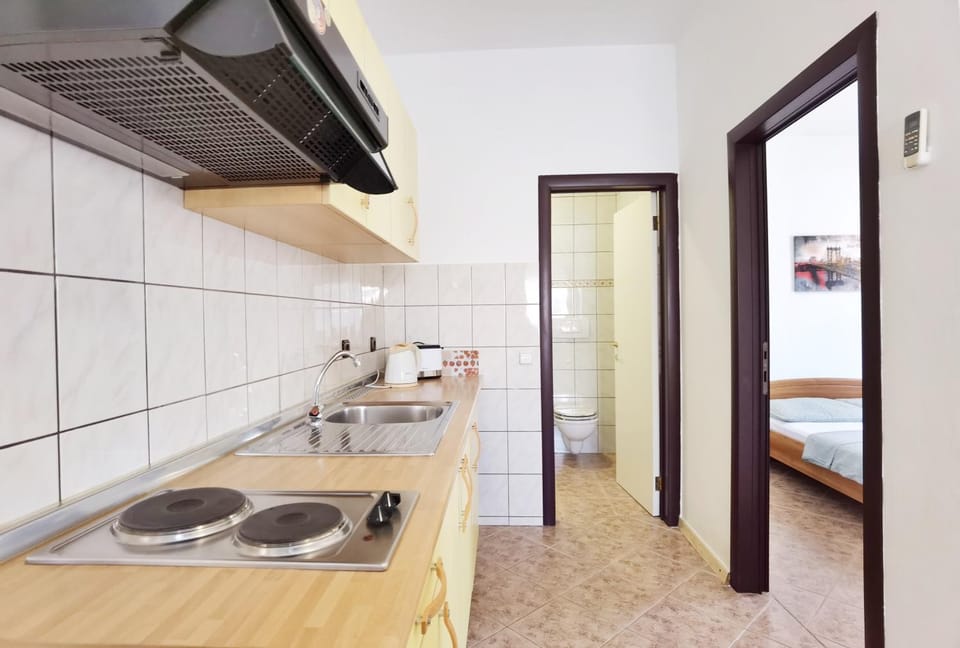 Kitchen or kitchenette, stove