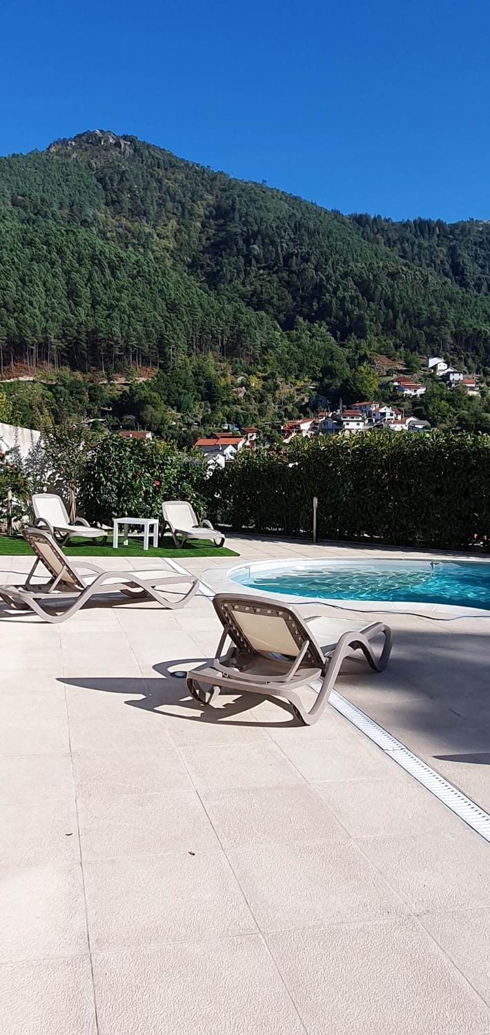 Day, Natural landscape, Mountain view, Swimming pool, sunbed