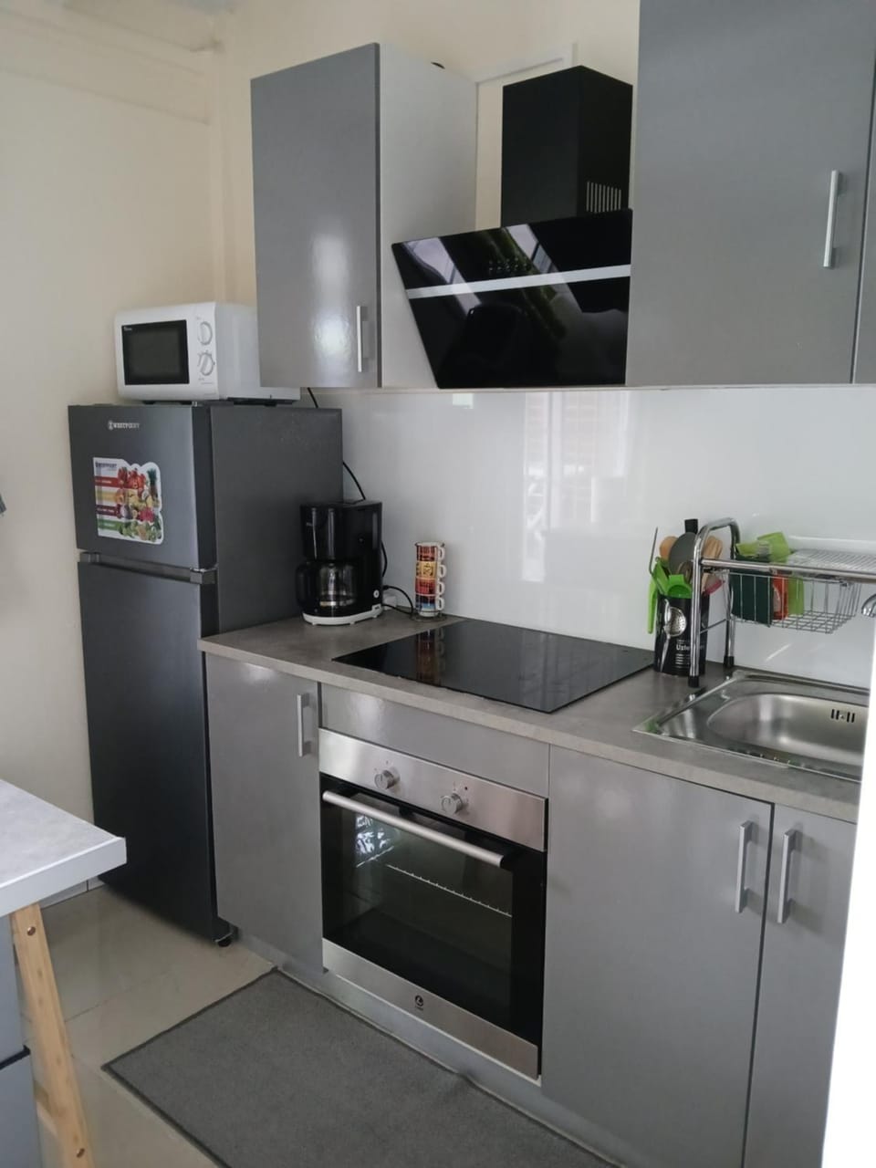 Kitchen or kitchenette, oven, stove