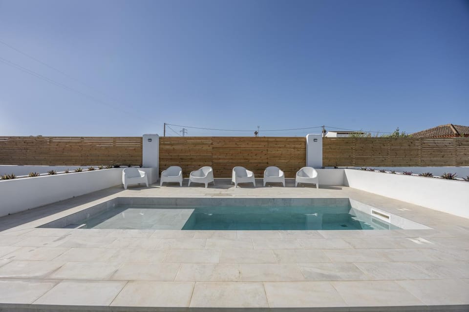 Property building, Living room, Swimming pool