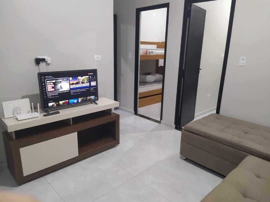 Communal lounge/ TV room, TV and multimedia, Living room, Photo of the whole room, Seating area, hair dresser