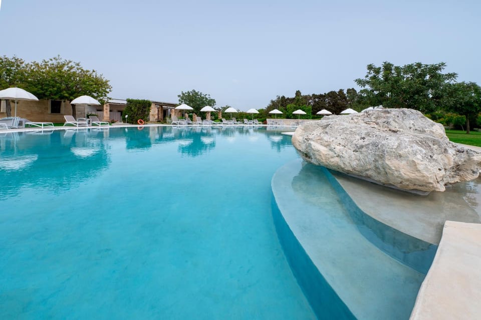 Property building, Living room, Swimming pool